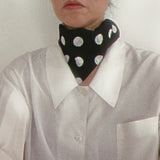 Easy on off bandana face covering and scarf. Perfect for travel. Add style and interest to any outfit.